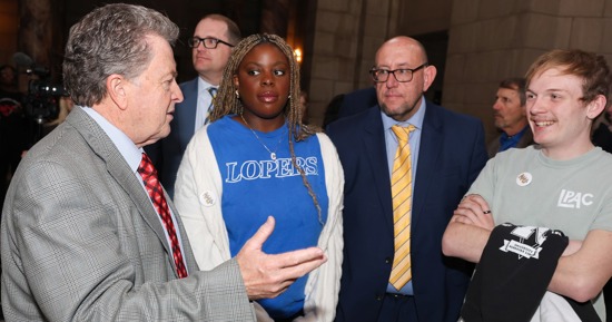 State Sen. Stan Clouse of Kearney, left, meets with UNK students and staff Wednesday during the “I Love NU” Day celebration at the State Capitol in Lincoln. (Photo by Erika Pritchard, UNK Communications)